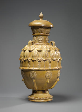 A magnificent and large olive-green-glazed slender oviform vase and cover with applied decoration Northern Qi Dynasty