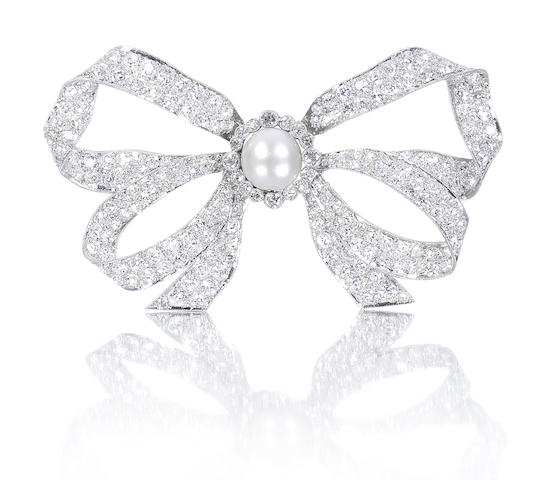 Bonhams : A pearl and diamond bow brooch,