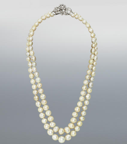 Bonhams : A double-row natural pearl necklace with diamond clasp