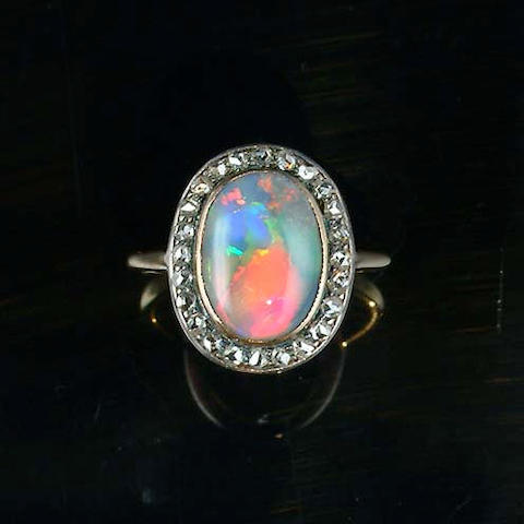 Bonhams : A late 19th century black opal and diamond cluster ring