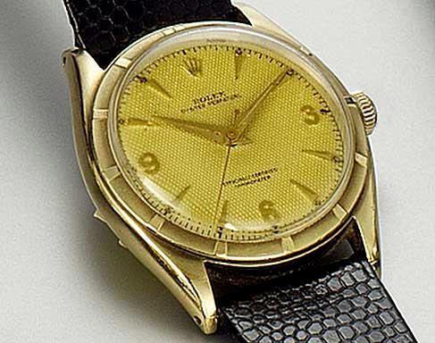 Bonhams : Rolex. A 10ct gold automatic centre seconds wristwatchRef ...