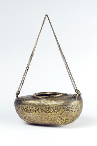 Bonhams : A Qajar brass kashkul Persia, late 19th Century,