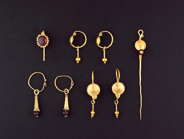 Bonhams : Two pairs of Roman gold earrings a single gold earring with a ...