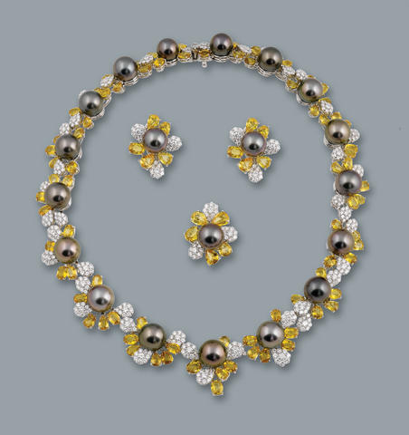 Bonhams : A cultured pearl, sapphire and diamond necklace, ring and ...