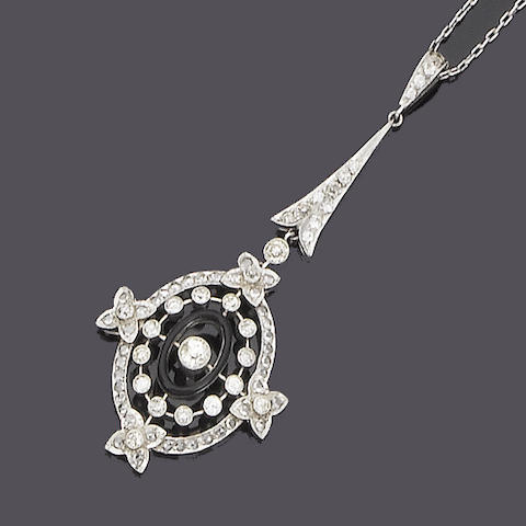 Bonhams : An onyx and diamond pendant necklace