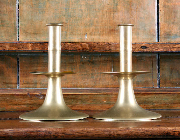 Bonhams : A rare pair of mid 17th Century English brass candlesticks Circa  1660