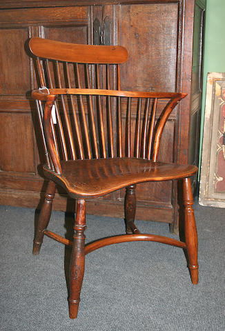 Bonhams : A mid 19th Century yew Windsor chair