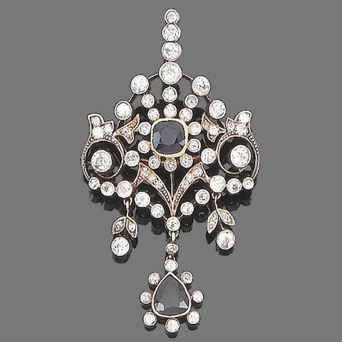 Bonhams : A sapphire and diamond brooch/pendant,