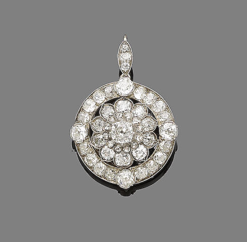 Bonhams : A late 19th century diamond cluster pendant/brooch,