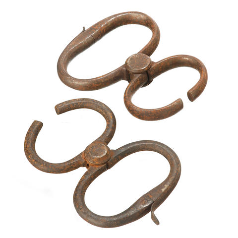 Bonhams : Two similar convict handcuffs, both stamped 'Hiatt' and one ...