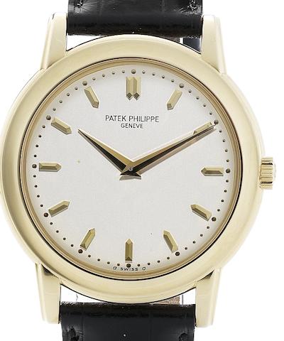 Bonhams : Patek Philippe. A fine 18ct gold automatic wristwatch with ...