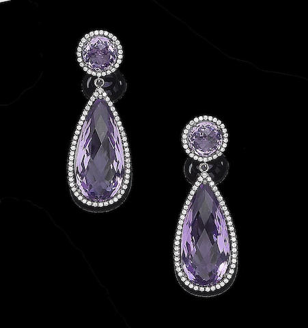 Bonhams : A pair of amethyst and diamond pendent earrings