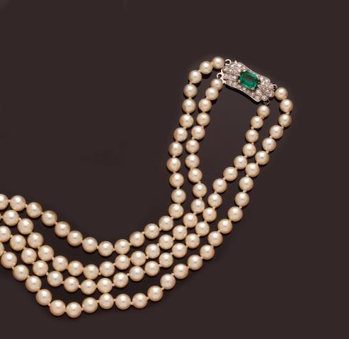 Bonhams : A cultured pearl necklace with gem set clasp