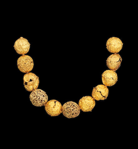Bonhams : A group of Fatimid gold Beads Egypt or Syria, 11th Century(11)