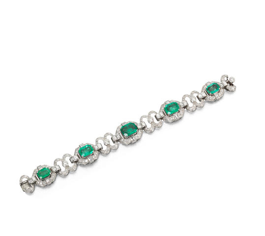 Bonhams : An Art Deco emerald and diamond strap bracelet,