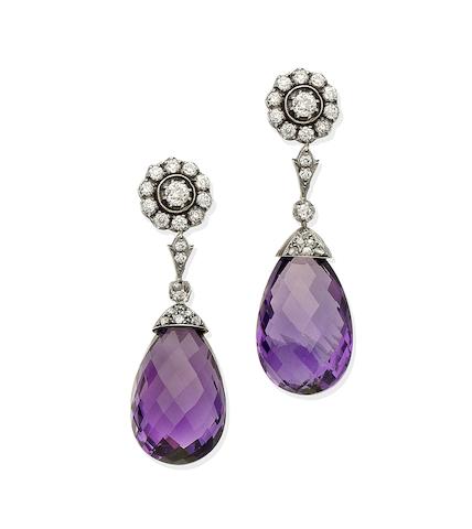 Bonhams : A pair of amethyst and diamond pendent earrings