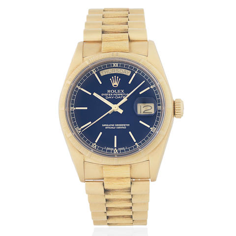 Bonhams : Rolex. An 18K gold automatic calendar bracelet watch Day-Date ...