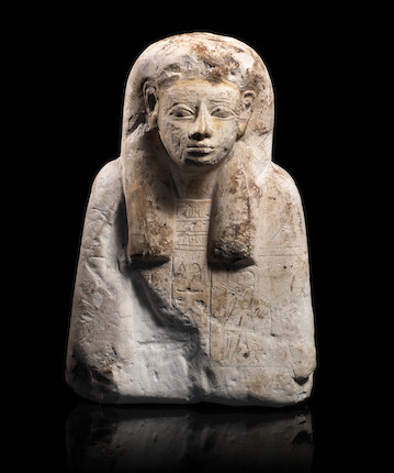 Bonhams : An Egyptian limestone anthropoid ancestor bust