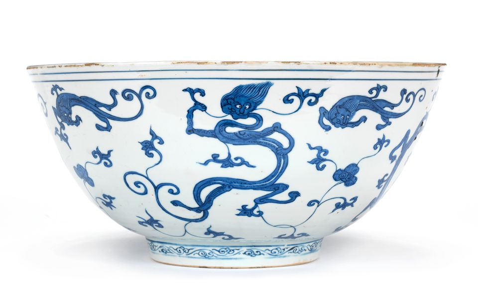 A large blue and white 'nine chilong' bowl Yutang Jiaqi mark, Wanli