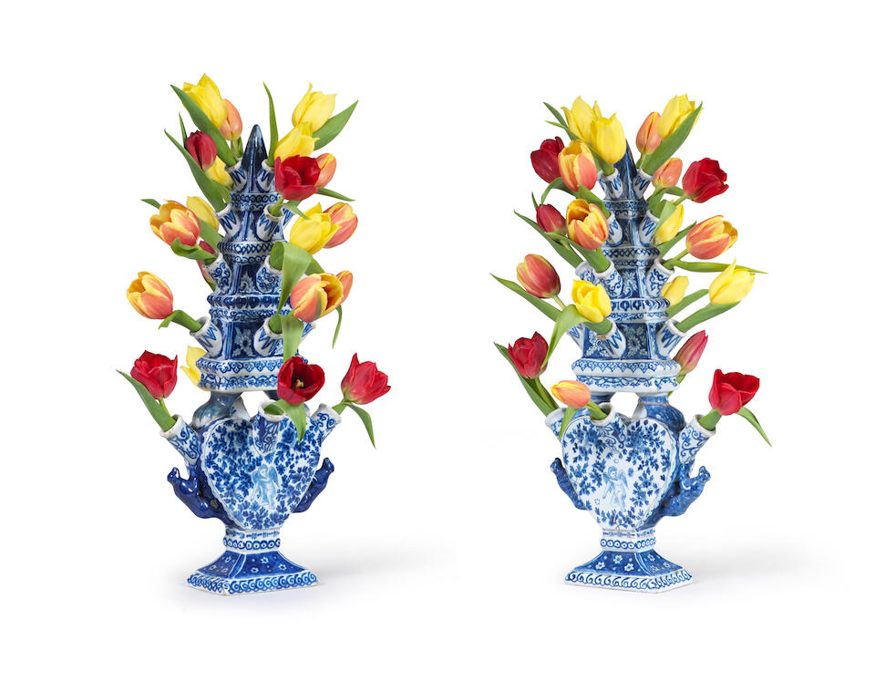 Bonhams A Pair of blue and white Delftware tulip vases, 19th century