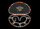 Thumbnail of An important emerald and seed-pearl Necklace from the Lahore Treasury, worn by Maharani Jindan Kaur (1817-63), wife of Ranjit Singh, the Lion of the Punjab (1780-1839)  Lahore, first half of the 19th Century image 1