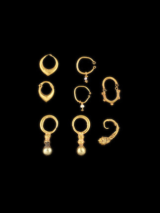 Bonhams : A Hellenistic gold earring and seven Western Asiatic gold ...