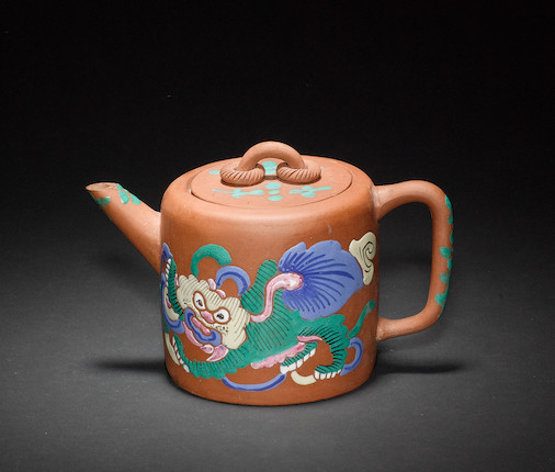 Bonhams : An Yixing teapot and cover, highlighted in famille rose ...