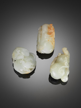 Bonhams : Three pale green jade 'fruit' carvings 18th/19th century