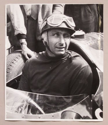 Bonhams : A signed photograph of Juan Manuel Fangio,