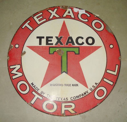 Bonhams : A circular Texaco Motor Oil enamel sign,