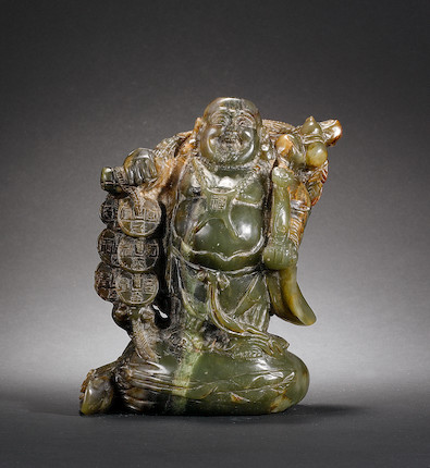 Bonhams : A green jade carving of Budai