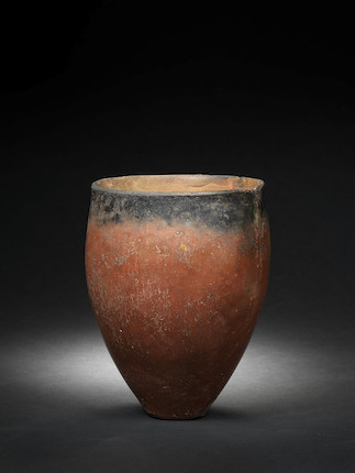 Bonhams : An Egyptian Predynastic black-topped pottery jar