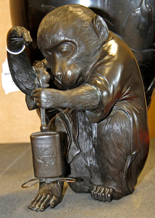 Bonhams : A Japanese bronze model of a crouching monkey