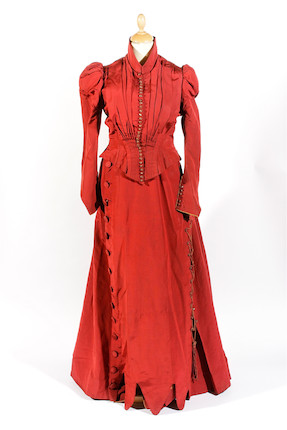 Bonhams : A 1880s red silk dress and mother and daughter's duster coats