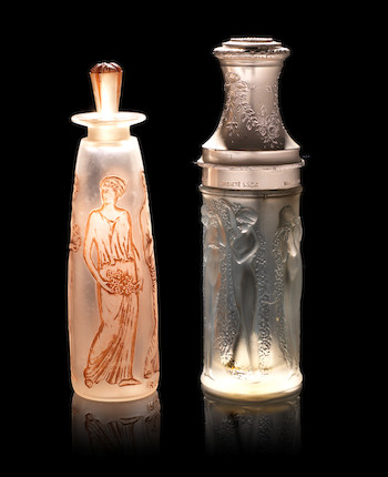 Lot - A collection of twenty-four Lalique miniature perfume bottles
