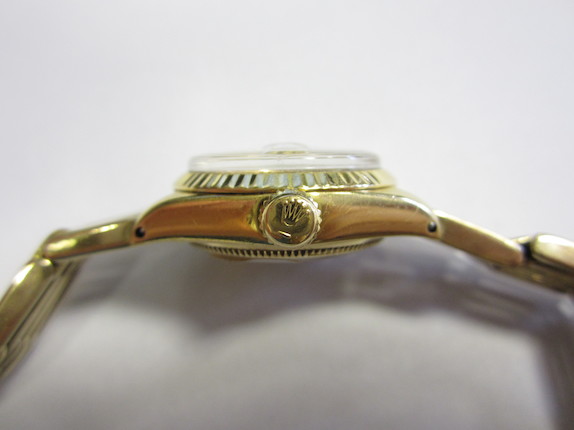 Bonhams : Rolex. A lady's 18ct gold automatic calendar bracelet ...