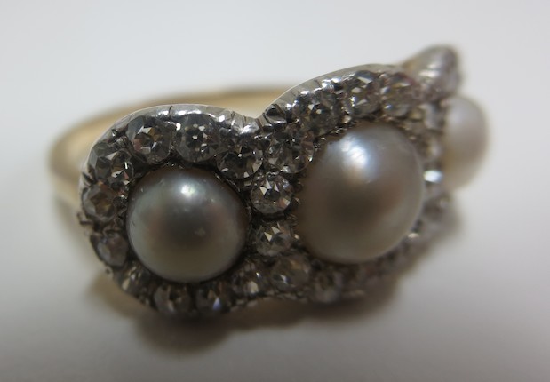 Bonhams : A pearl and diamond triple cluster ring