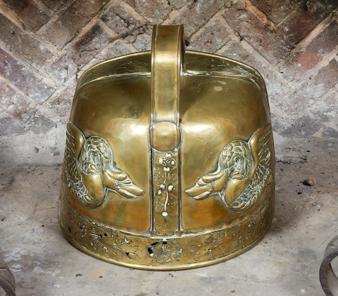 Bonhams : A late 17th century and later embossed brass fire curfew ...