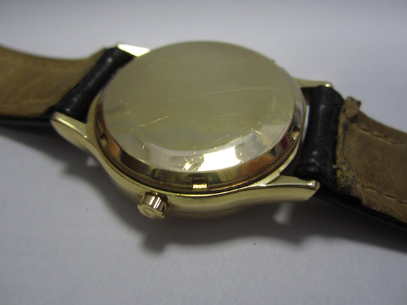 Bonhams : Omega. An 18ct gold electronic calendar wristwatch F300 ...