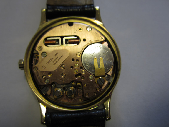 Bonhams : Omega. An 18ct gold electronic calendar wristwatch F300 ...