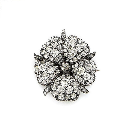 Bonhams : A diamond flower brooch,