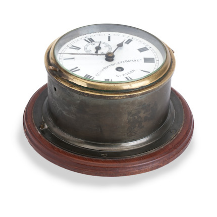 Bonhams : An early 20th century brass cased bulkhead clock, the dial ...