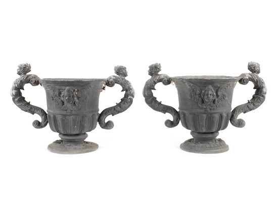 A pair of cast lead garden urns in the 18th century style  (2) image 1