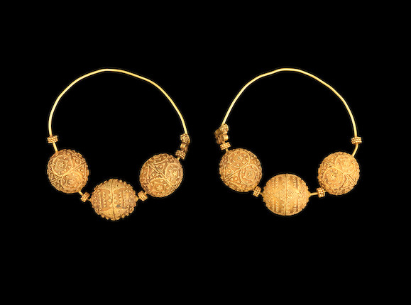 Bonhams : A pair of Seljuk filigree gold Earrings Persia, 12th Century