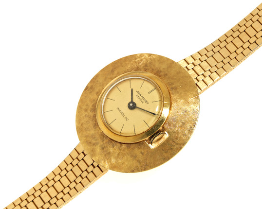 Bonhams : Jean Perret, Geneve. A lady's 18K gold and steel manual wind ...