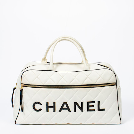 Bonhams : White Vintage Sports Line Boston Travel Bag, Chanel, c. 1994,  (Includes serial sticker)