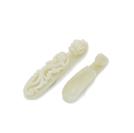 Bonhams : TWO PALE GREEN JADE BELT HOOKS 18th/19th century (2)