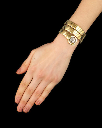 Bonhams : BULGARI 'GEMME NUMMARIE' TUBOGAS BANGLE,