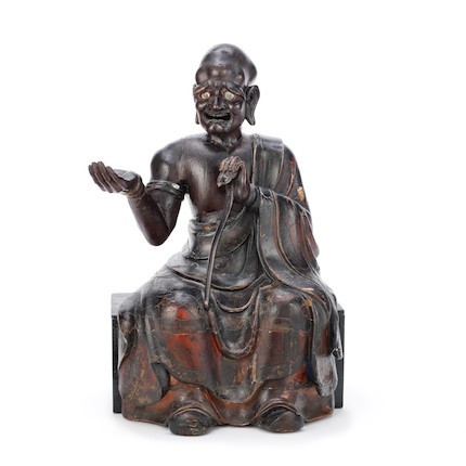 Bonhams : A LARGE LACQUERED WOOD CARVING OF A SEATED LUOHAN Qing Dynasty