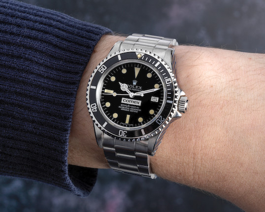 Bonhams : Rolex. A fine and rare stainless steel automatic calendar  bracelet watch being offered by a former Comex diver Comex Sea Dweller, Ref  1665, Circa 1977